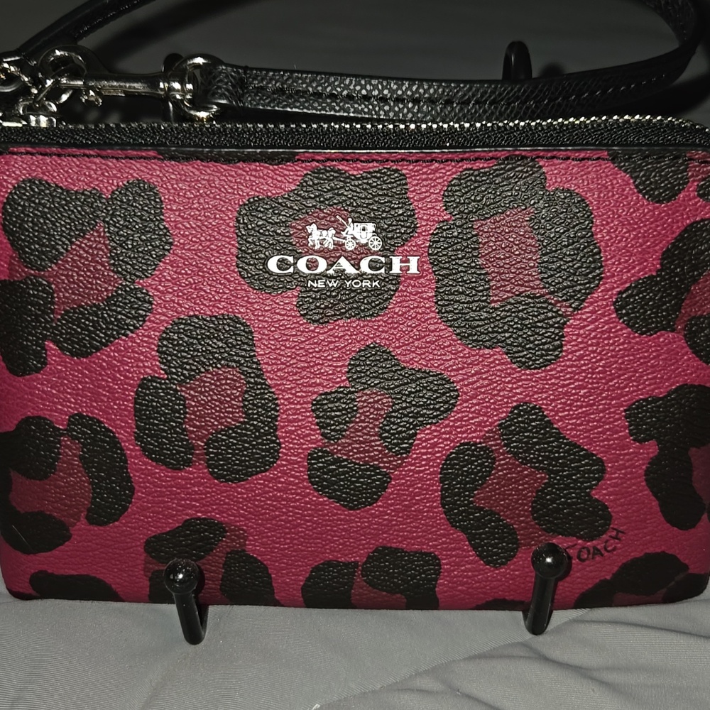 Coach Oselot Corner Zip Wristlet featuring an leopard print red and black. RARE